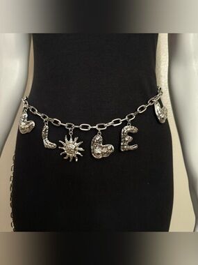 Silver tone metallic charms chain belt